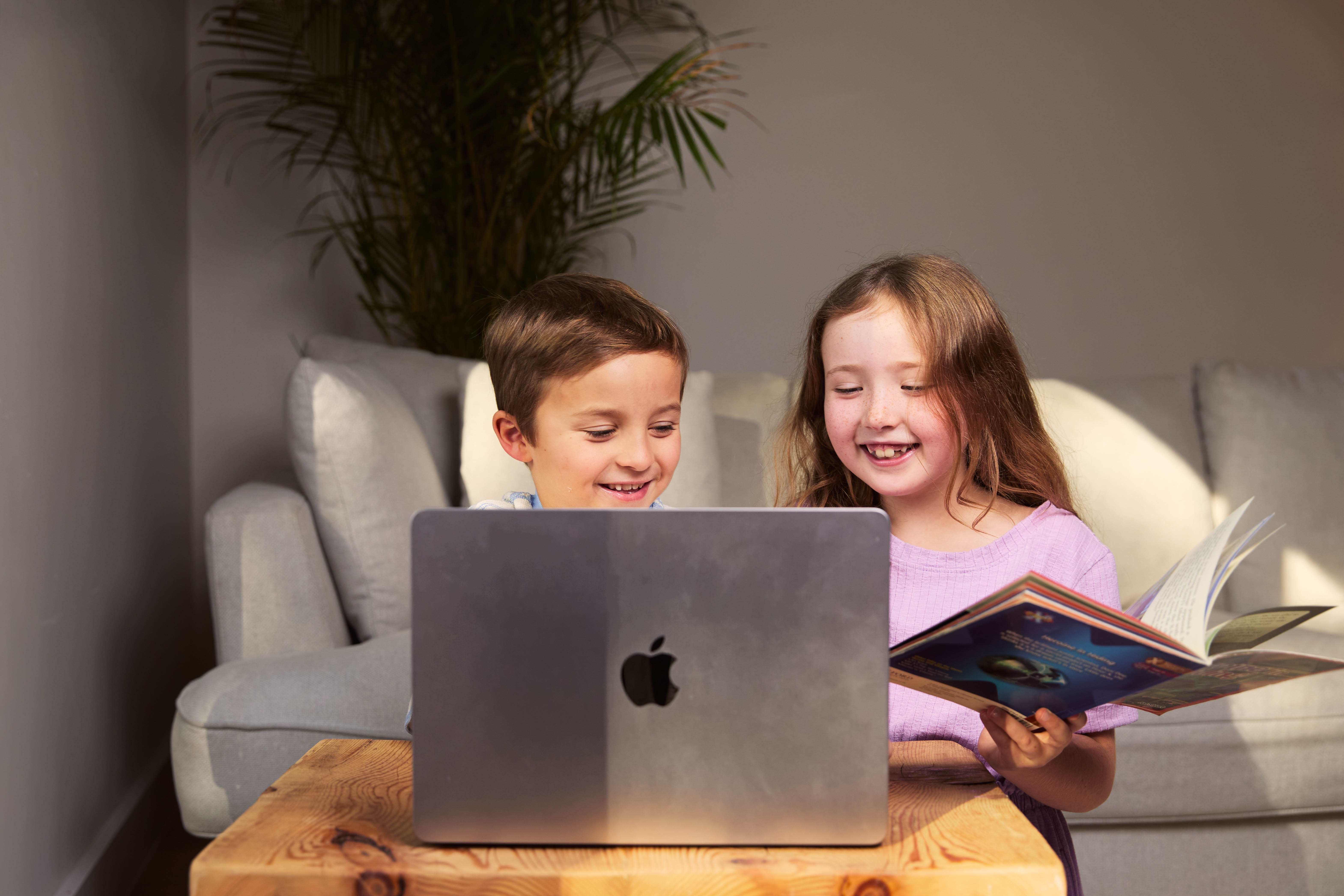 A child joining a reading session from home